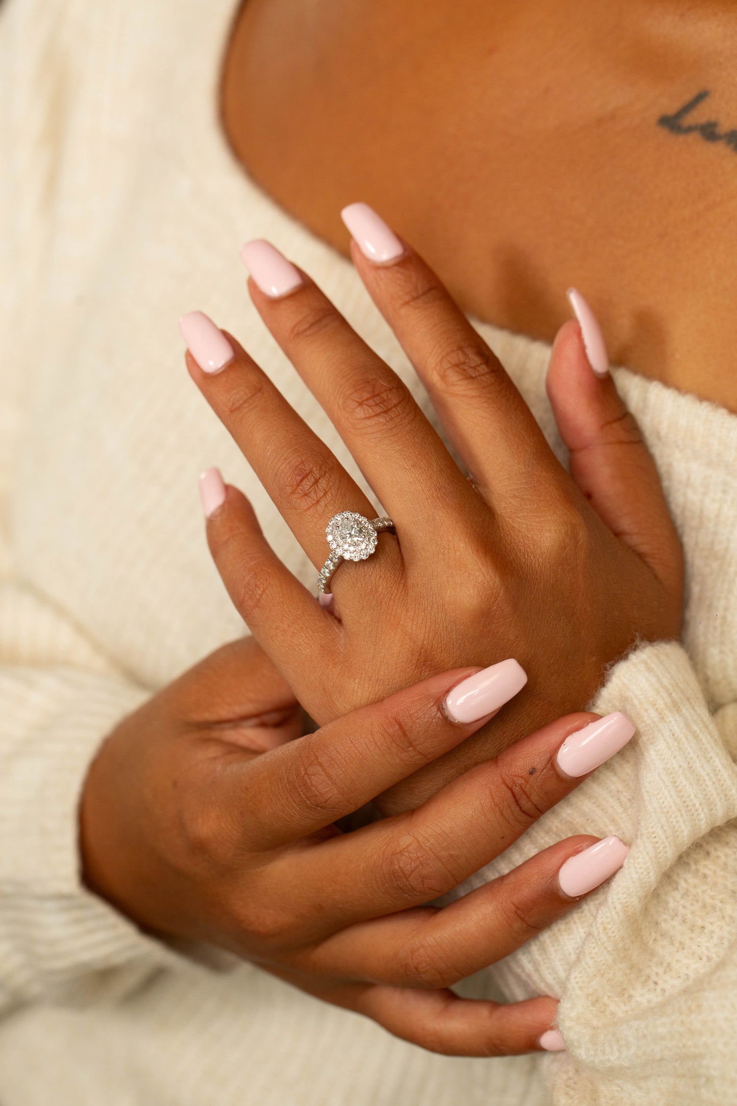 Double Halo Ring with 0.45 Ct Oval Center Diamond