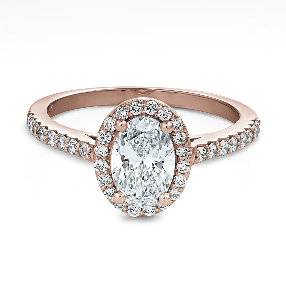 1.00 Carat Oval Diamond and Diamond Halo Ring
