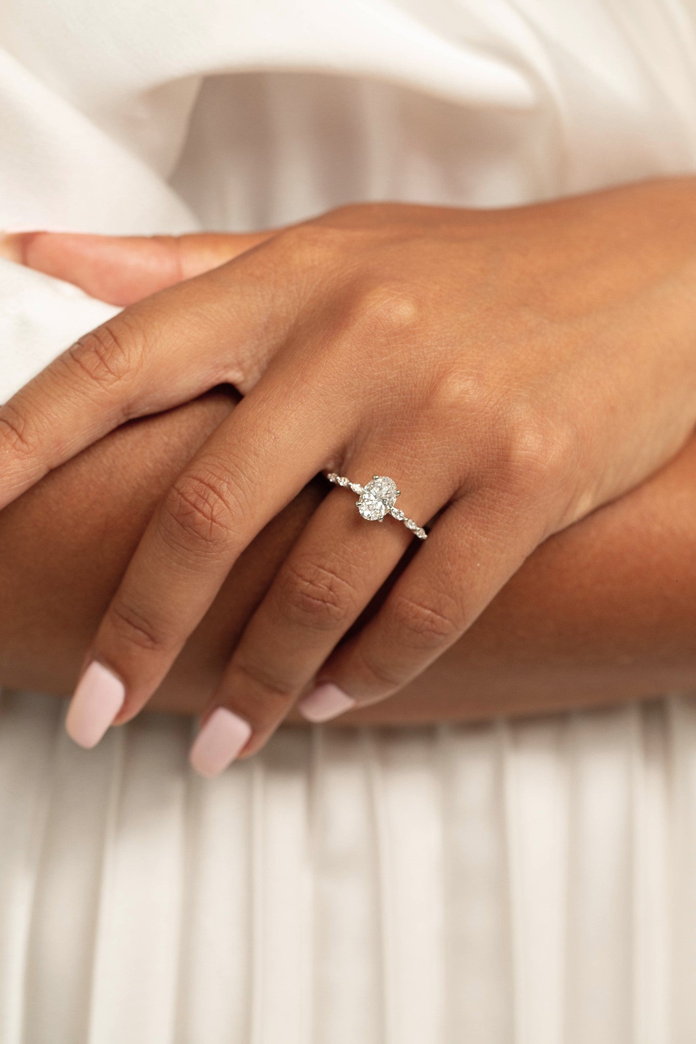 Ring with 2.00 Ct Oval Diamond and Marquises