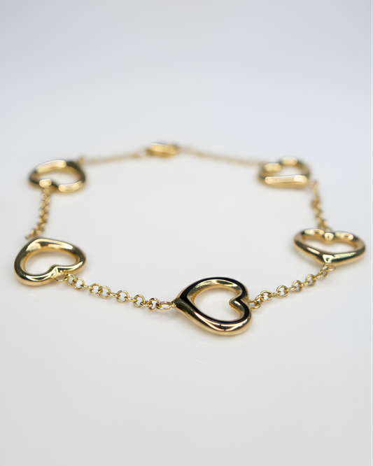Bracelet Silhouettes de Cœurs – Or Jaune 10K