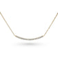 Minimalist curved bar necklace set with diamonds or emeralds in 14k gold