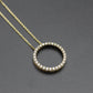 Collier rond en or et diamants. collier pour femme. collier serti de diamants. collier en diamants. pendentif en or pour femme. pendentif avec diamants montréal.